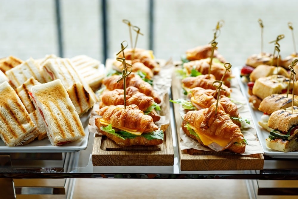 A beautifully arranged catering spread with various dishes perfect for catering for business lunch.