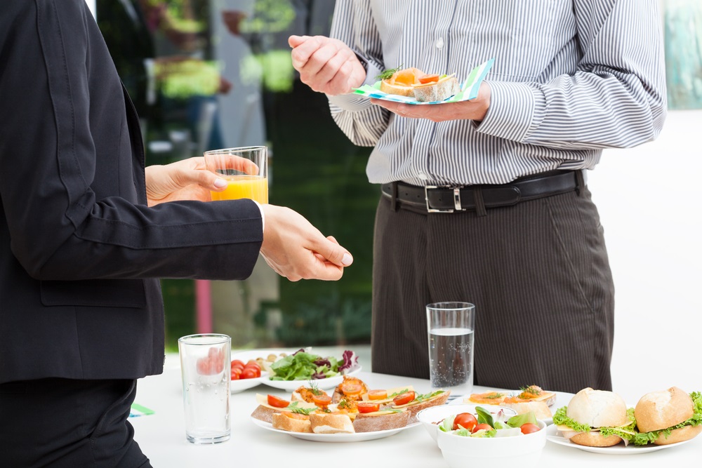 Caterer delivering last minute catering for an office event