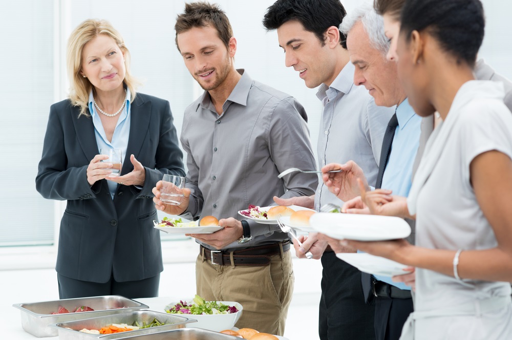 Caterer delivering last minute catering for an office event