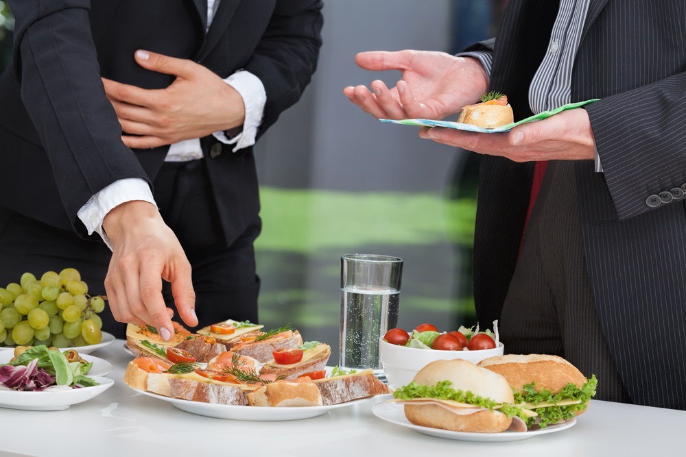 Caterer delivering last minute catering for an office event