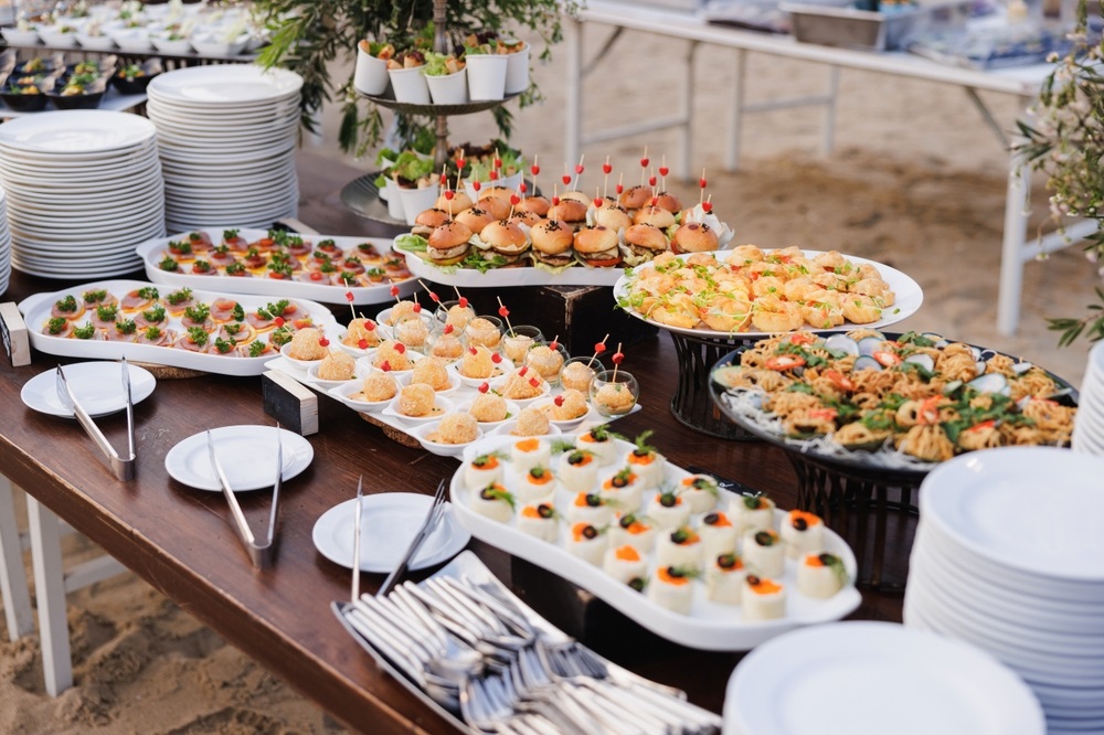 Corporate event food ideas for employees enjoying delicious catering options.