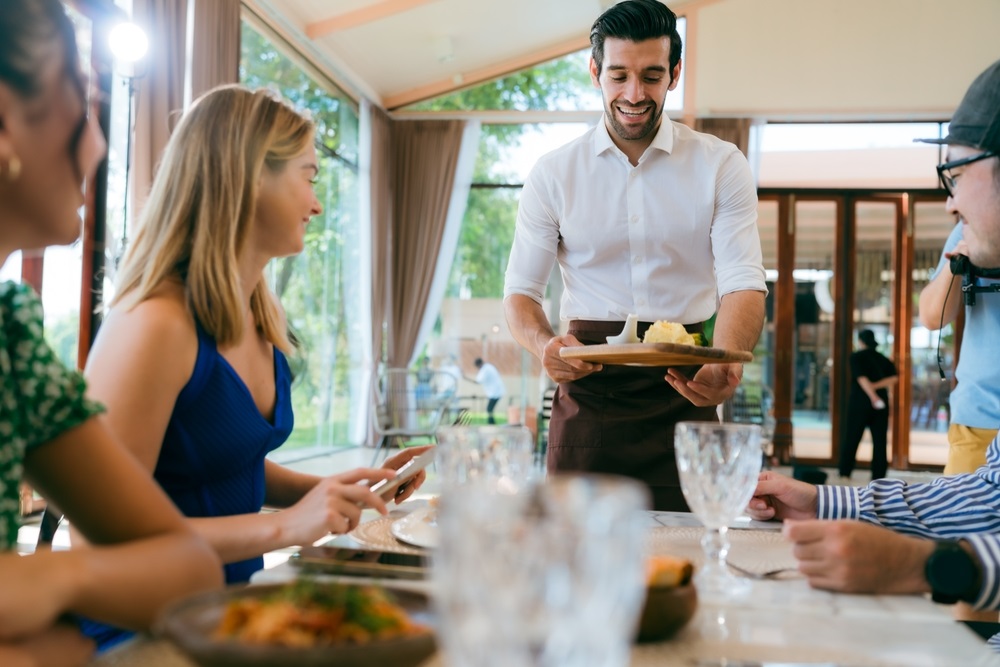 A team enjoying a variety of healthy, catered staff lunch options.